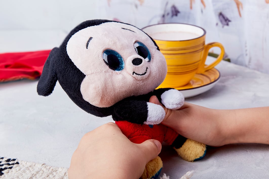 Kid Plays with Mickey Mouse. Collectible Disney Magic in a Toy